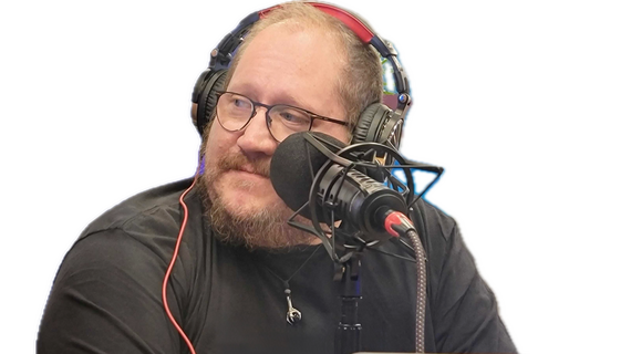 Photo of Shally speaking into a microphone